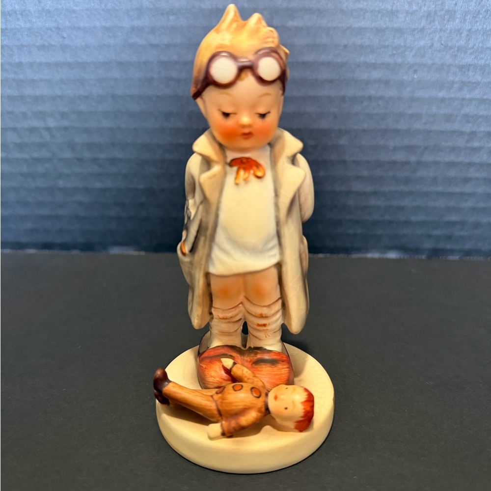 Hummel Ceramic Figurine with Cream and Brown Accents